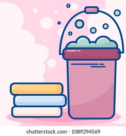 cleaning and laundry concept. bucket with soap water with bubbles and clean