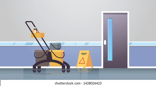 cleaning service trolley cart with supplies caution wet floor sign janitor company concept modern corridor interior flat horizontal