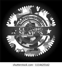 Cleaning Services written on a grey camouflage texture