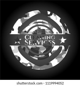 Cleaning Services written on a grey camouflage texture