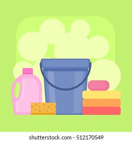 Cleaning tools on bright green background.