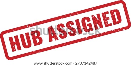 A clear red grunge rubber stamp features the text "Hub Assigned," signifying a successful allocation or distribution point.