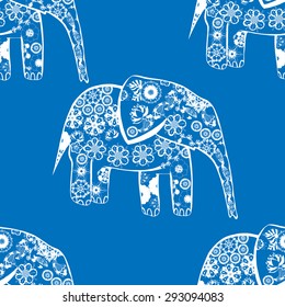 Clear seamless texture with stylized patterned elephants in Indian style. Vector illustration