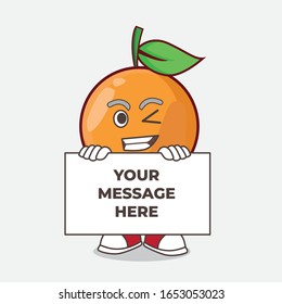 Clementine Orange cartoon mascot character with funny face hides behind a board