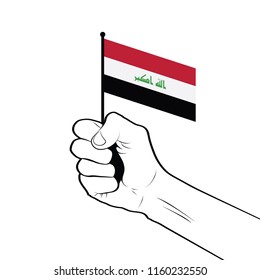 Clenched fist raised in the air holding the national flag of Iraq