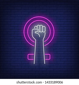 Clenched hand and female symbol neon sign. Justice, feminism, enforcement design. Night bright neon sign, colorful billboard, light banner. Vector illustration in neon style.