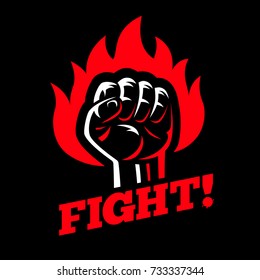 Clenched raised fist in fire on dark black background. Protest and fight strike poster symbol concept