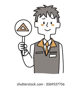 A clerk at a consumer electronics retail store holding a triangular tag