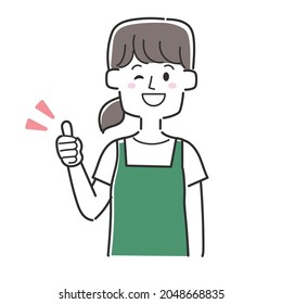 A clerk wearing a thumbs-up apron