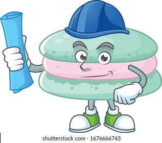 A clever Architect of vanilla blue macarons with blue prints and blue helmet