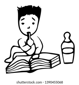 Clever child reads and thinks over an open book. For kindergartens, developmental centers