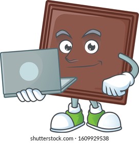 A clever one bite chocolate bar mascot character working with laptop