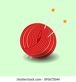 Clew of red yarn and knitting needles. Isolated elements on green background.