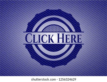Click Here emblem with jean texture