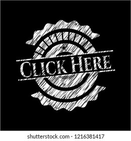 Click Here written on a chalkboard