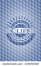 Cliff blue badge with geometric background.