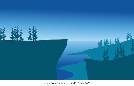 Cliffs of silhouette at the night with blue backgrounds