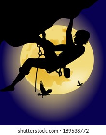 climber on the background of the full moon