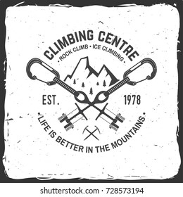 Climbing Centre badge. Vector. Concept for shirt or logo, print, stamp or tee. Vintage typography design with carabiners, climbing cams, hexes and mountain silhouette. Extreme adventure.