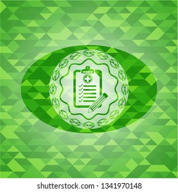 clinic history icon inside realistic green emblem. Mosaic background