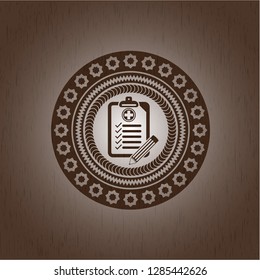clinic history icon inside vintage wooden emblem