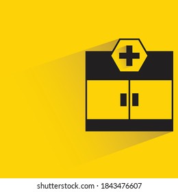 clinic icon drop shadow on yellow background