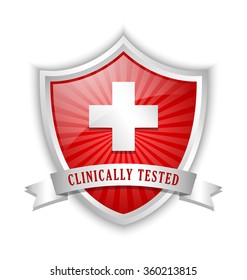 Clinically tested symbol shield with cross and ribbon on white background