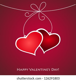 Clip art vector greeting card of two colorful Valentine Day pendant gradient volumetric hearts of pink and purple color bound with an delicate bead white ribbon hanging. Slight shadow on background