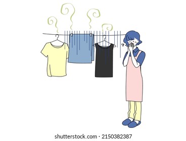 Clip art of woman in trouble with laundry that smells freshly dried.