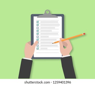 Clipboard With Checklist Icon. Businessman Holding A Pencil Completed Checklist On Clipboard. Business Concept. Hand Filling Checklist On Clipboard. Man Signing A Paper Work Document.