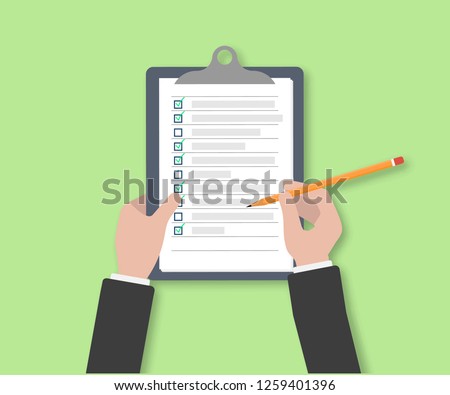 Clipboard with Checklist icon. Businessman Holding a Pencil Completed Checklist on Clipboard. Business concept. Hand filling checklist on clipboard. man signing a paper work document.