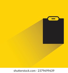 clipboard with shadow on yellow background