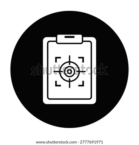 A clipboard with a target symbol on a black background, representing focus and accuracy in business or education settings for goals and objectives.