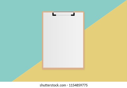 Clipboard with white sheet on green and yellow color background, Minimal concept
