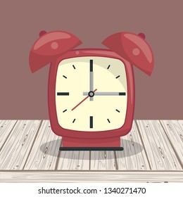 Clock bells alarm on table