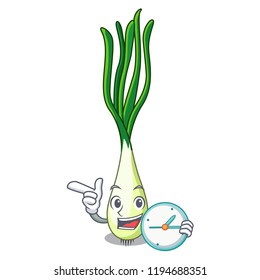 With clock cartoon fresh green onions on cutting board