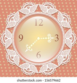 Clock with frame of lace on fabric