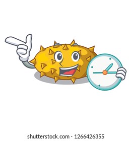 With clock fruit Kiwano the isolated mascot