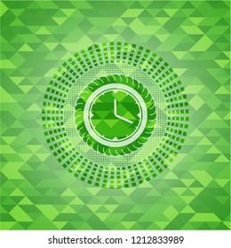 clock, time icon inside green mosaic emblem
