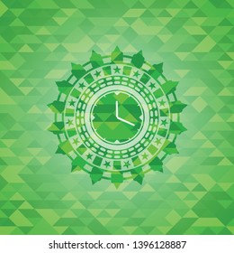 clock, time icon inside green emblem with mosaic background