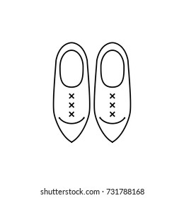 Clogs pair of shoes flat line vector icon on isolated white background. Vector outline illustration of traditional wooden dutch footwear. Klompen image in minimal design.