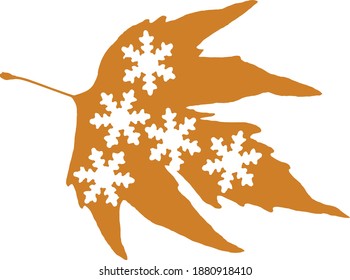 close up autumn leaves and snowflakes