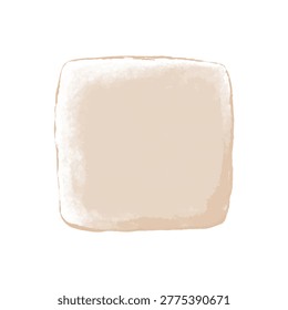 Close up of a beige square candy with rounded edges