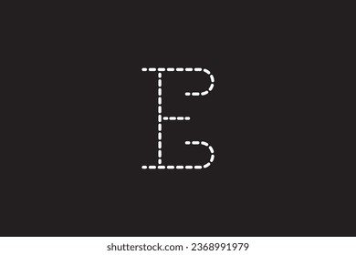 a close up of a black background with a white letter E