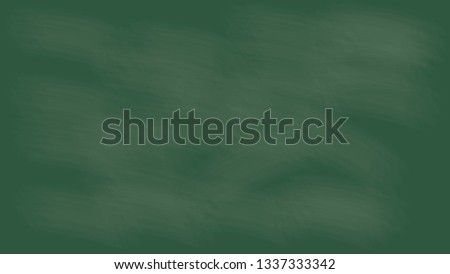 Close up of a black dirty chalkboard
