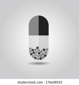Close up of capsule on gray background - Gray colors, detailed content, and transparent container