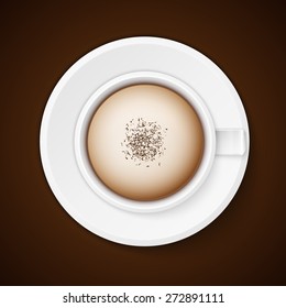 close up of coffee cup on brown background