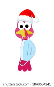 Close up of a cute holiday cartoon turkey wearing a santa hat with a surgical face mask hanging from his beak in preparation for the Coronavirus pandemic
