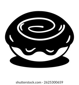 Close up of a doughnut with a chocolate glaze. The doughnut is sitting on a white background