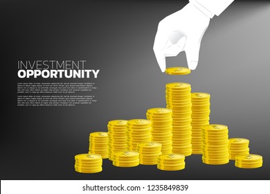 close up hand of businessman  with coin and stack of  golden coin. Concept of  success and growth in  business